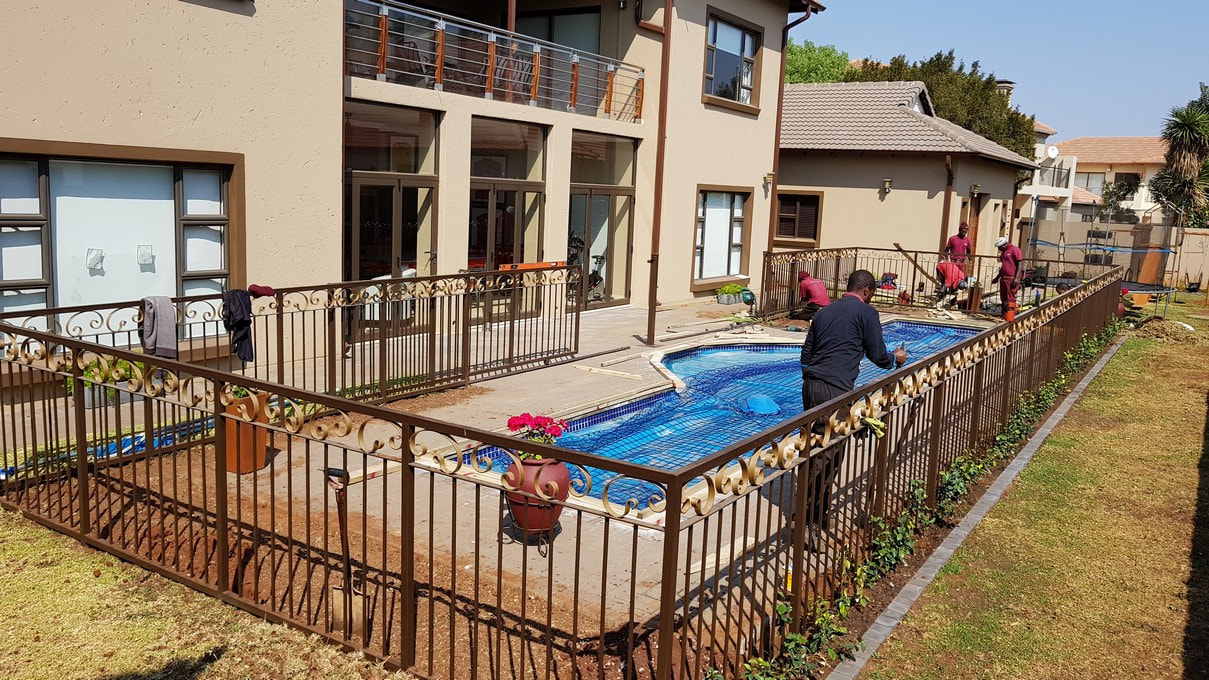Timbermann employees are constructing a red ironbark pool and patio deck at Midstream Estate.