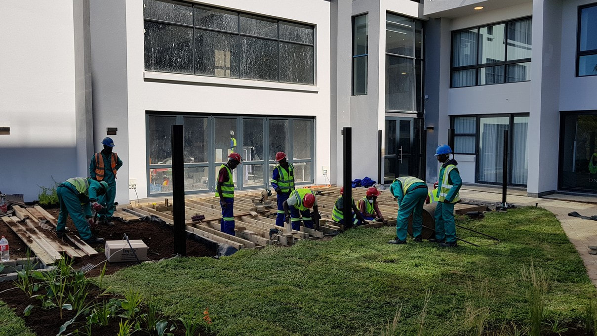 Timbermann workers build a MoistureShield composite deck in Ashlea Gardens, Pretoria.